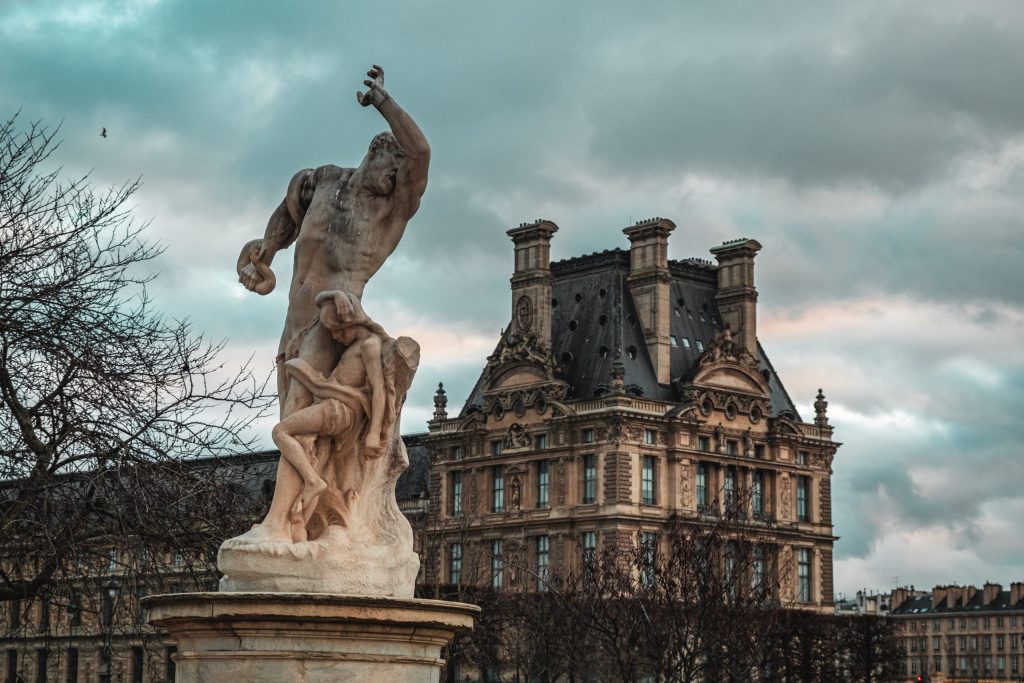 Louvre Gardens A sculpture in the Louvre Gardens, with a wing of the museum visible in the background